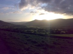 start of the walk on the Pennine way, as the sun rises of the hills.